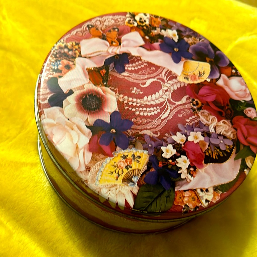 Vintage Avon tin can